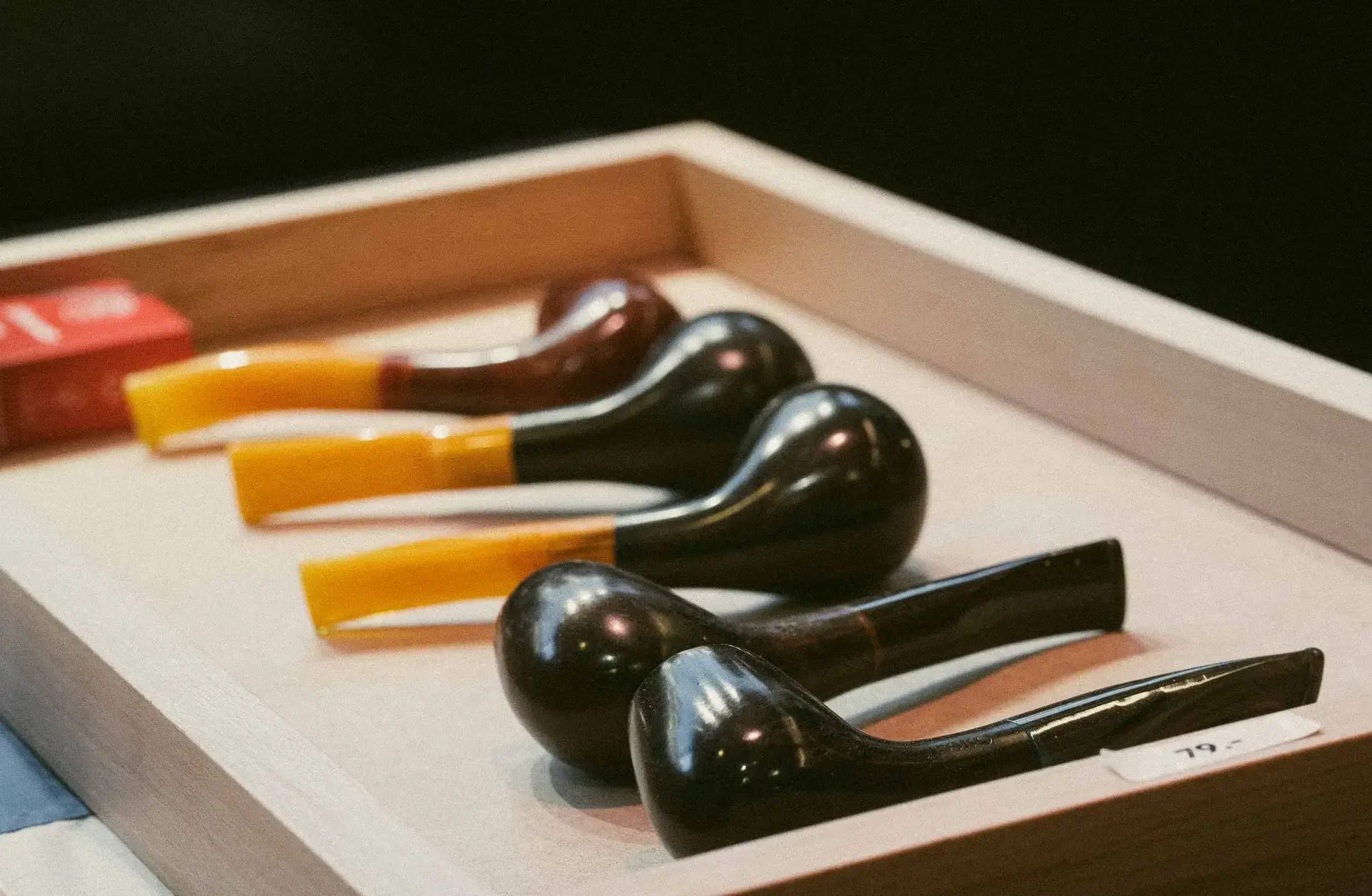 Collection of elegant smoking pipes displayed at Histoires de Cigares